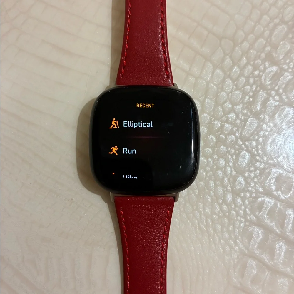 Fitbit Smartwatch with Red Strap